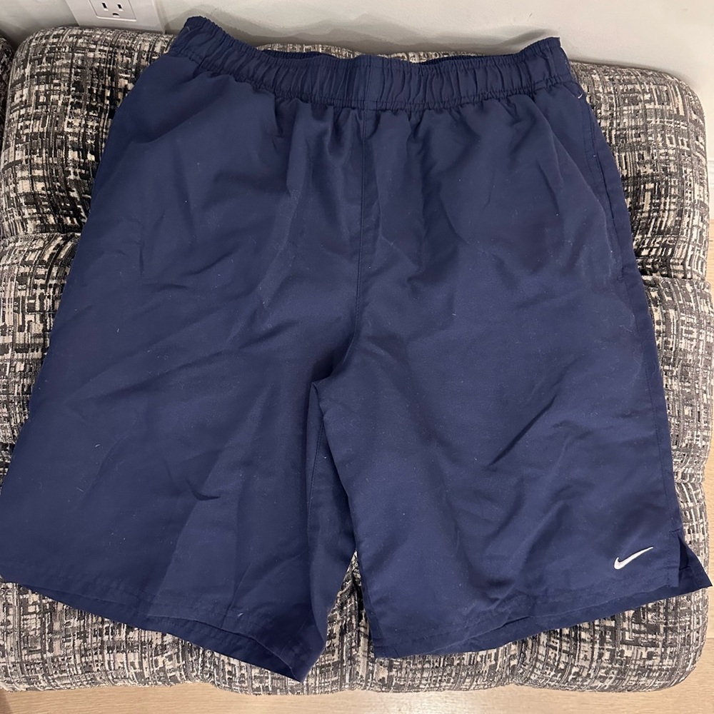 Nike's Essential 9” Solid Lap Swim Trunks - image 1